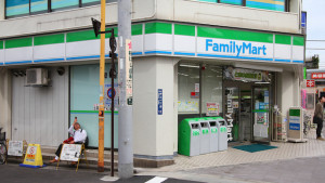 TOKYO - APRIL 19: Family Mart convenience store on April 19 2012 in Tokyo Japan. FamilyMart is one of largest convenience store franchise chains in Japan with 7604 shops (2012).