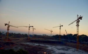 Cranes tower over the construction site for one of about 20 malls going up in Vientiane. 