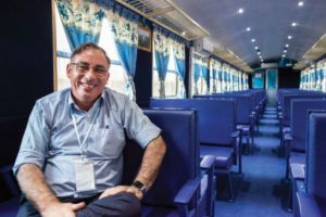 Royal Railway CEO John Guiry on one of Cambodia’s refurbished trains.