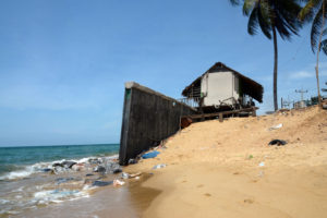 The only thing between this house in Pattani province and the strong waves is a seawall.